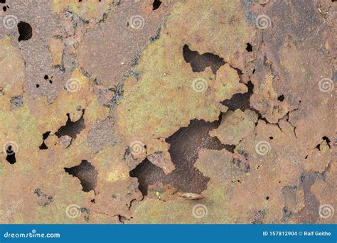 Pitting Through Corrosion Of A Metal Sheet Stock Photo Image Of Rough