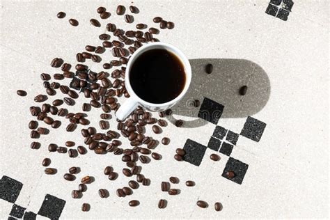 Black Coffee Grains And Hot Coffee Stock Photo Image Of Macro