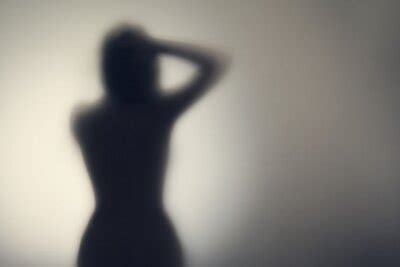 Silhouette Of Naked Womans Body Behind Glass Door Concept Cartazes Para A Parede Posters