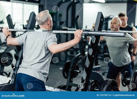 Senior Sportsman Lifting Barbell Stock Photo Image Of Grey Working