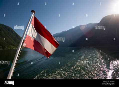 Austrian flag at stern of a ship on Lake Hallstatt, Hallstatt ...
