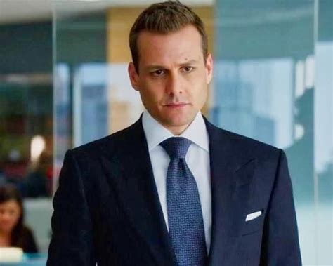 Harvey Specter is wearing a blue tie, black suit and white shirt by Tom Ford in Suits. | Black ...