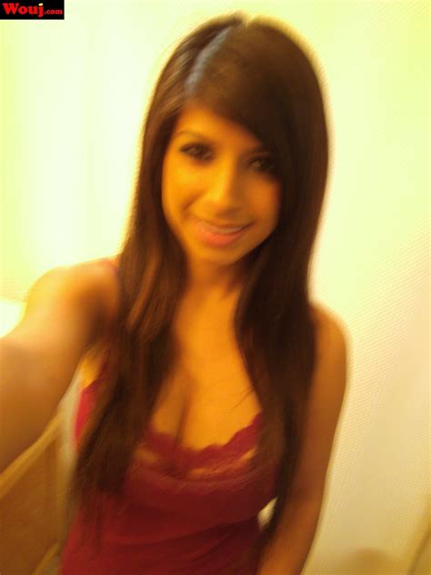 Good Looking Brunette Girl Teasing With Her Big Cleavage Photos