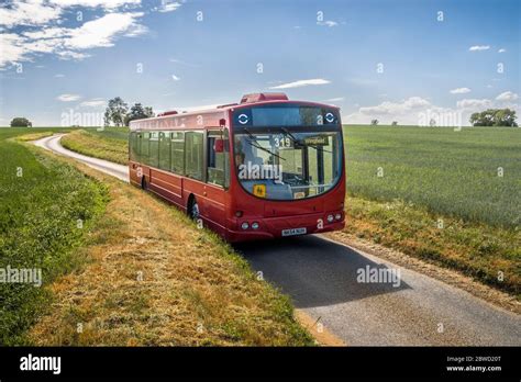 Rural Bus Service Bus On A Narrow Country Road In Suffolk East Anglia