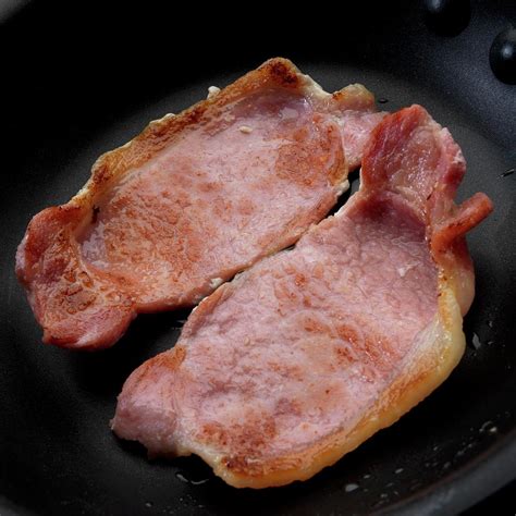 Fried English Style Bacon In Skillet Photograph By Paul Poplis Fine