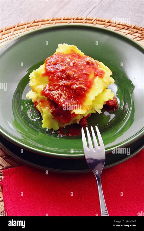 original italian tortelloni with meat sauce Stock Photo - Alamy