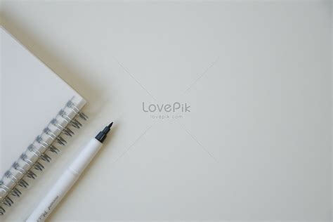 A White And Simple Business Background Made Up Of Notepad And Pe