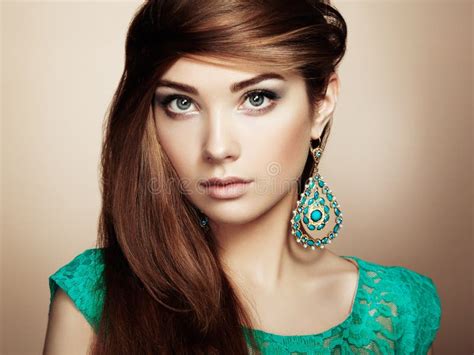 Portrait Of Beautiful Brunette Woman With Earring Perfect Makeup Stock