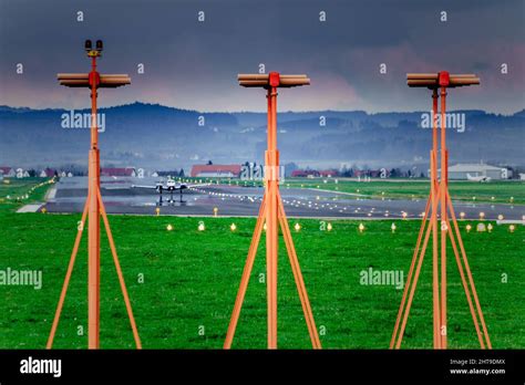 Plane landing at Friedrichshafen airport Stock Photo - Alamy