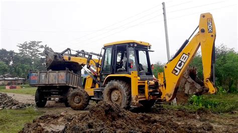 Skillful Jcb Oprator Loading Soil In Tractors Jcb Dx Making Drain