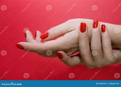 Beautiful Female Hands With Red Manicure And Nail Isolated Stock Image