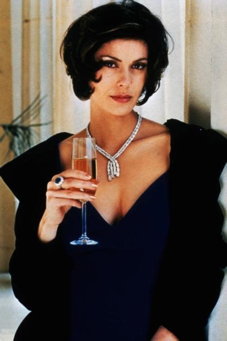 The 77 Most Iconic Bond Girl Outfits Revealed Best Teri Hatcher And James Bond Ideas