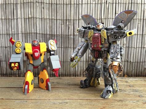 Animated Omega Supreme And Mp Omega Supreme Transformers Artwork