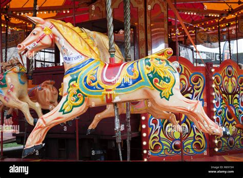 Carousel Horse Merry Go Round With Galloping Horses At Funfair At