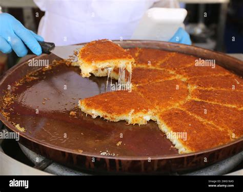 Knafeh Kunefe Is A Traditional Middle Eastern Dessert Made With Spun Pastry Called Kataifi