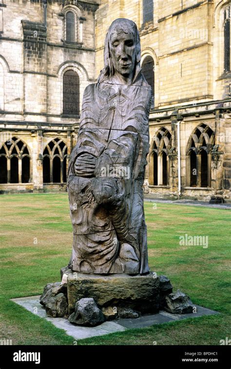 Durham Cathedral cloisters, modern statue of St. Cuthbert England UK ...