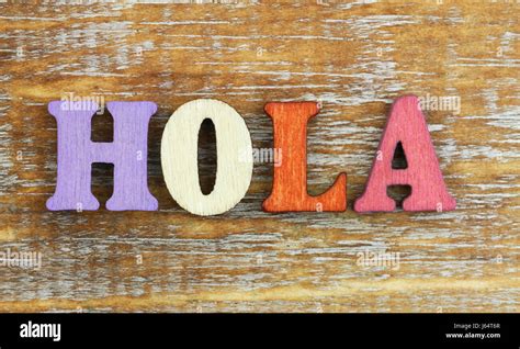 Hola (Hello in Spanish) written with colorful wooden letters Stock ...