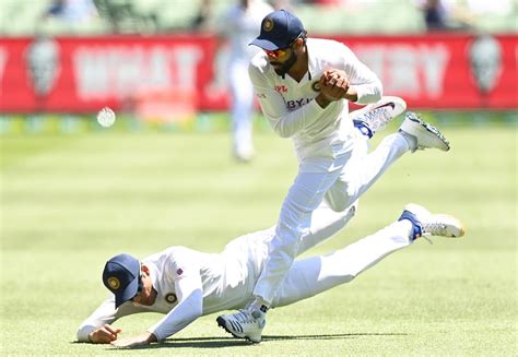 Ravindra Jadeja hangs on to a catch after nearly colliding with Shubman ...