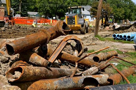 Cracked Old Sewer Pipe Located In Local River With Wastewater Coming