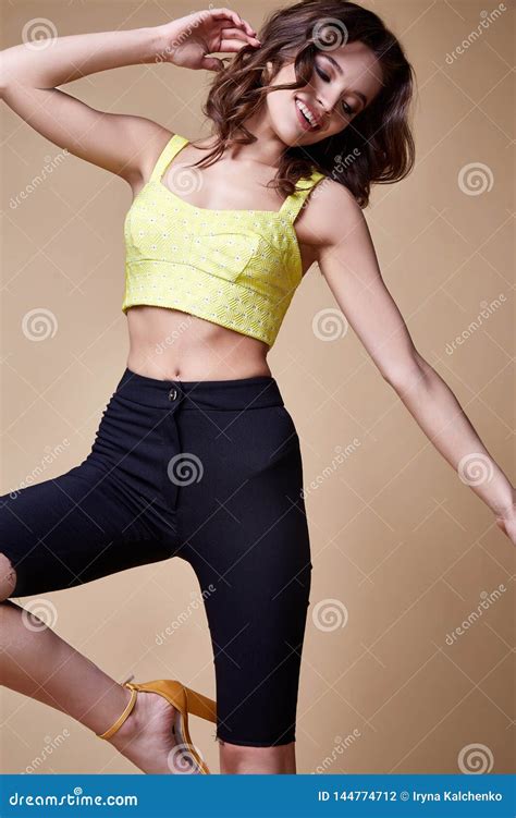 Beautiful Woman Fashion Glamour Model Brunette Hair Makeup Wear Blouse Trousers Skinny Shorts