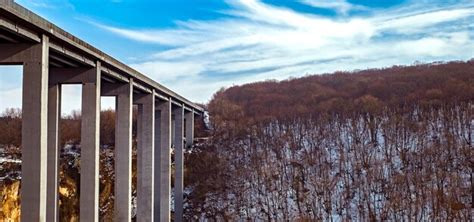 Premium Photo | Viaduct and winter forest