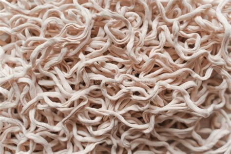 Tangled Beige Threads Yarn Noodles Texture Background Stock Image