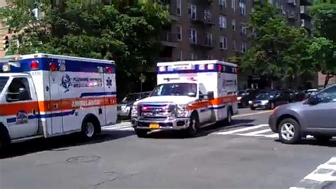 Flushing Hospital Ambulance Responding And Arriving On Scene Of A