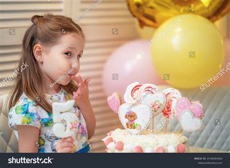 Happy Birthday Smiling Little Girl Holds Stock Photo (Edit Now) 2130503162