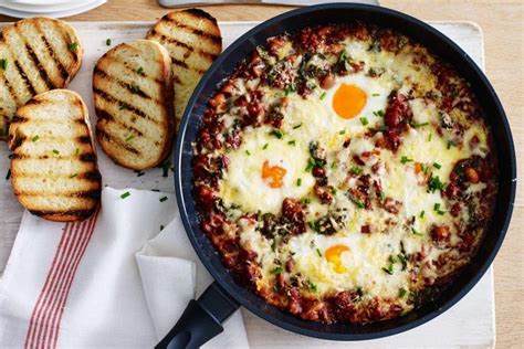 Cheesy Baked Eggs With Tomato And Chorizo