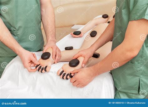 Woman Receiving Hot Stones Massage Stock Photo Image Of Body Legs