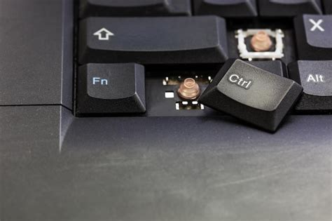 Premium Photo | Broken laptop keyboard button