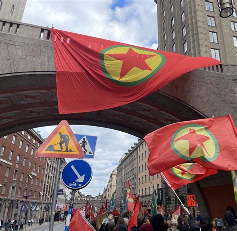 Giant PKK flag in Stockholm today in protest of Sweden bowing to the ...