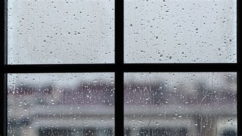 The Rain Drops on Window Glass 34328653 Stock Video at Vecteezy