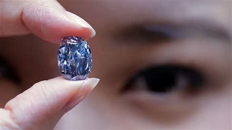 Blue diamond sells for record-setting $31.8 million - ABC7 Los Angeles