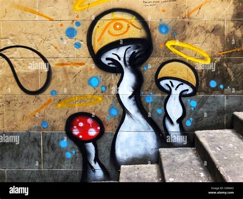 Mushroom graffiti art in alley Stock Photo - Alamy