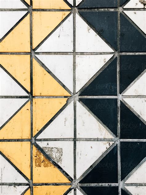 Dirty Floor Tiles Overhead By Stocksy Contributor Visualspectrum