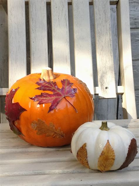 Me and my shadow: Decorating pumpkins with leaves