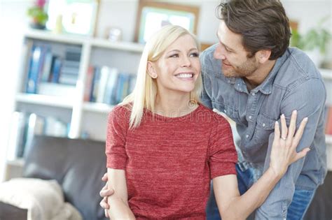 Couple Hug And Happy On Sofa In Home Living Room Bonding Or People