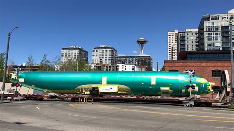 Plane On A Train A Boeing Fuselage Travels Through Seattle By Train On