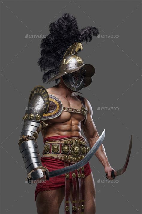 Combative Roman Gladiator With Plumed Helmet And Two Swords Stock Photo