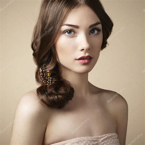 Portrait of young beautiful girl Stock Photo by ©heckmannoleg 22499805