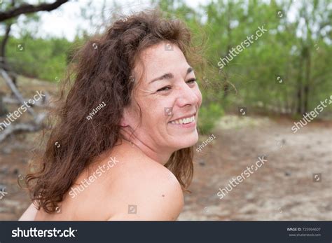 Naked Woman Sitting On Beach Smiling Stock Photo 725994607 Shutterstock