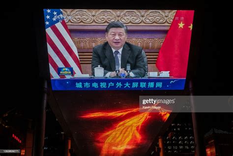 A Large Screen Displays Chinas President Xi Jinping During A Virtual