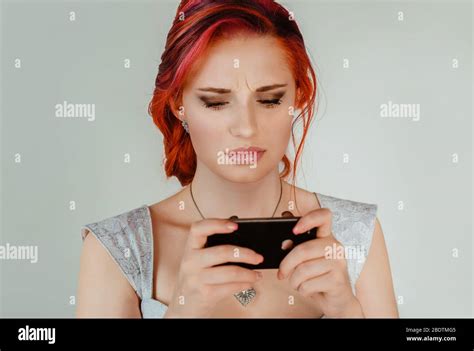 Upset Woman Texting Closeup Portrait Of Stressed Woman Holding