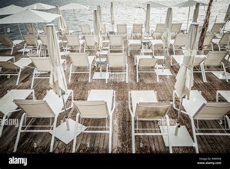 Overview Of A Beautiful Solarium Facing The Sea On A Hot Summer Day Horizontal View Stock Photo