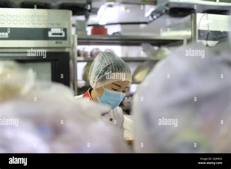 Staff Of Haidilao A Chain Of Hot Pot Restaurants Prepare Food Which Will Be Soon Delivered To