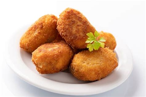 Croquetas De Queso De Cabra Y Cebolla Caramelizada