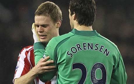 Ryan Shawcross 'deeply upset' after tackle leaves Aaron Ramsey with ...