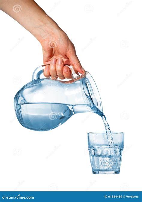 Hand Pouring Water From Glass Pitcher Stock Photo Image 61844459