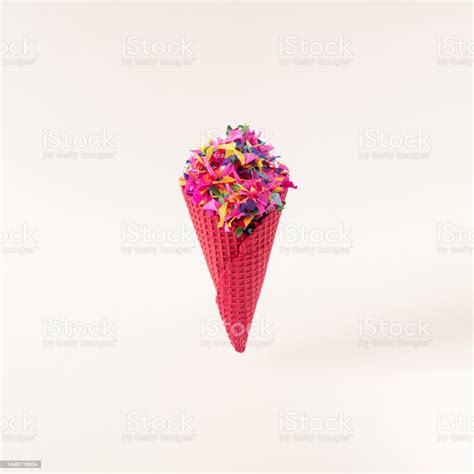 Red Ice Cream Cone With Colorful Confetti On White Background Minimal